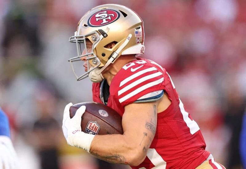 Christian McCaffrey #23 of the San Francisco 49ers rushes during the first quarter against the Dallas Cowboys at Levi's Stadium on October 08, 2023 in Santa Clara, California. The 49ers vs Vikings Prediction is ready for analyze.