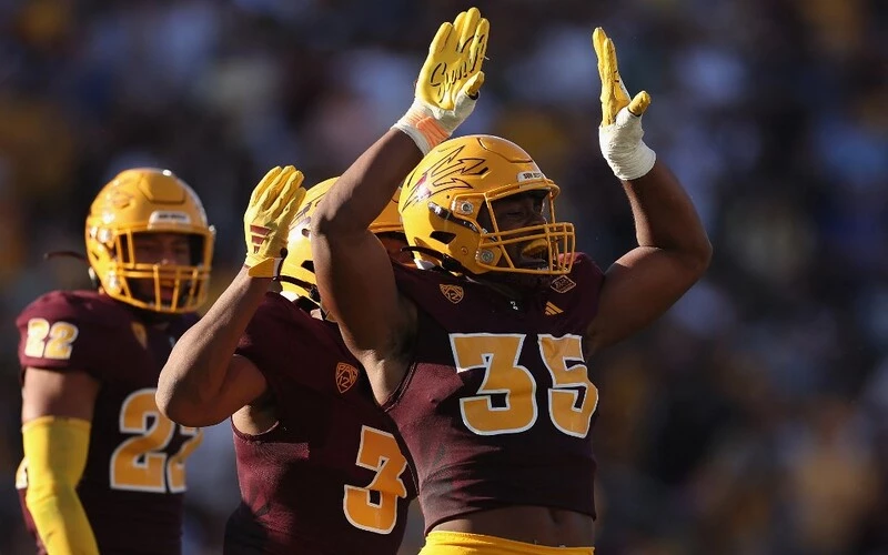 Defensive lineman B.J. Green II #35 of the Arizona State Sun Devils celebrates after a sack against the Colorado Buffaloes