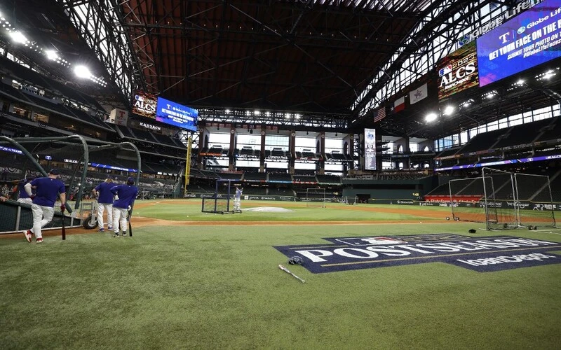 The Texas Rangers take batting practice prior to Game Three of the American League Championship Series against the Houston Astros at Globe Life Field on October 18, 2023 in Arlington, Texas. The Astros vs Rangers Odds are set for tonight's game.