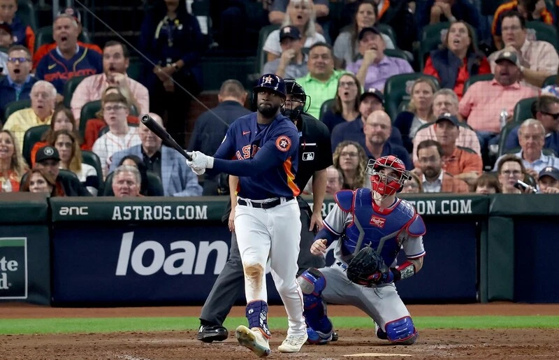 Yordan Alvarez #44 of the Houston Astros hits a solo home run against Aroldis Chapman #45 of the Texas Rangers during the eighth inning in Game Two of the American League Championship Series. The Astros vs Rangers Odds are set for tonight's game.