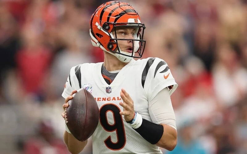 Quarterback Joe Burrow #9 of the Cincinnati Bengals looks to pass during the NFL game at State Farm Stadium on October 08, 2023 in Glendale, Arizona. The Bengals defeated the Cardinals 34-20. The Bengals vs 49ers odds are already set.