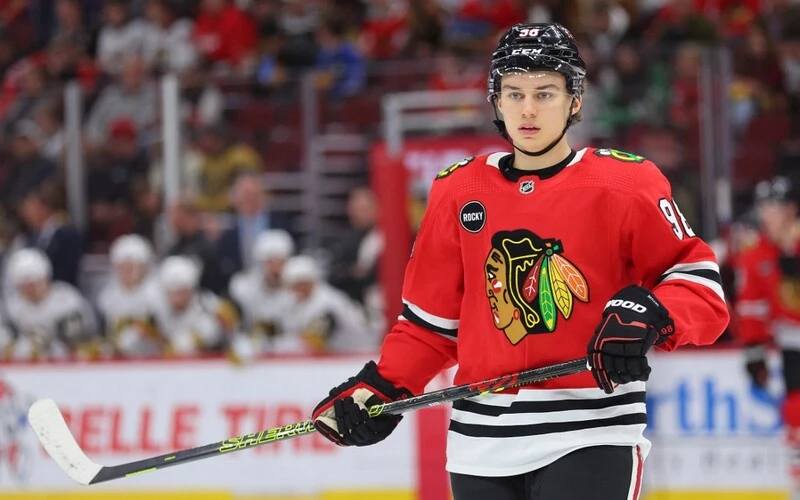 Connor Bedard #98 of the Chicago Blackhawks looks on against the Vegas Golden Knights during the second period at the United Center on October 21, 2023 in Chicago, Illinois. The Blackhawks vs Golden Knights Odds are set.