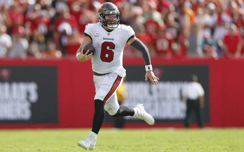 Baker Mayfield #6 of the Tampa Bay Buccaneers scrambles with the ball during the fourth quarter of the game against the Atlanta Falcons at Raymond James Stadium on October 22, 2023 in Tampa, Florida. The Buccaneers vs Bills Odds are ready for Thursday's game.