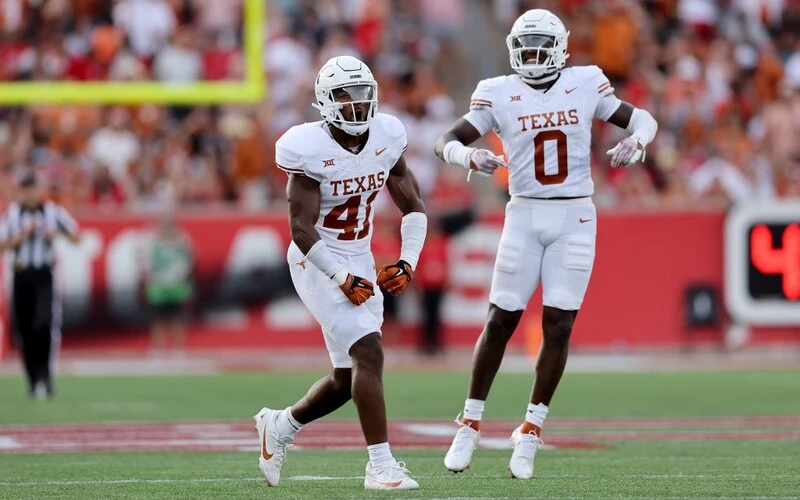 Jaylan Ford #41 of the Texas Longhorns reacts after forcing a fumble in the second half against the Houston Cougars at TDECU Stadium on October 21, 2023 in Houston, Texas. The BYU vs Texas Odds are set for Saturday's game.