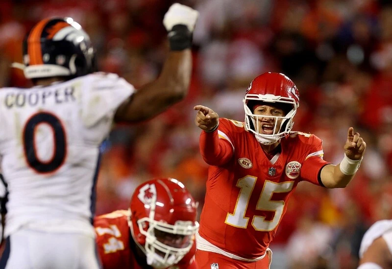Patrick Mahomes #15 of the Kansas City Chiefs calls a play against the Denver Broncos. The Chargers vs Chiefs Betting Odds are ready.