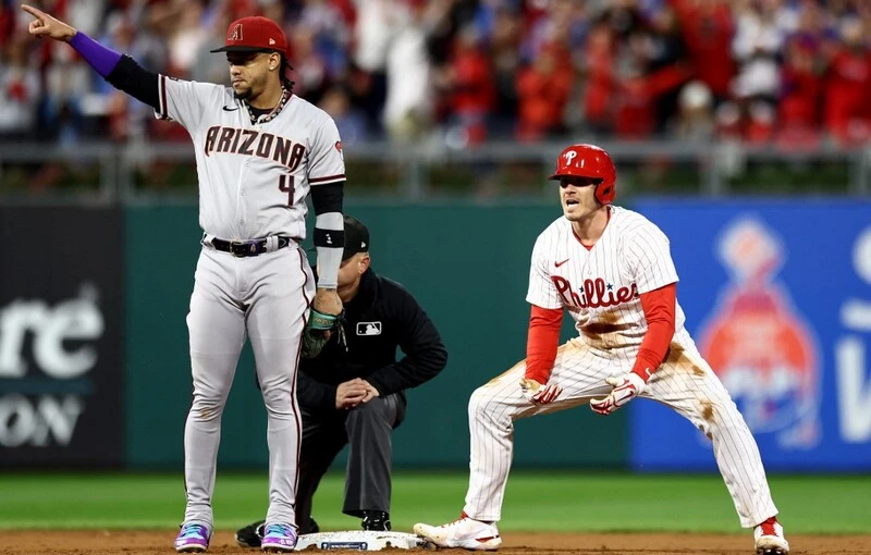 Realmuto #10 of the Philadelphia Phillies reacts after reaching second base for a double in the fifth inning against the Arizona Diamondbacks. The Diamondbacks vs Phillies Predictions for Game 2 are set.