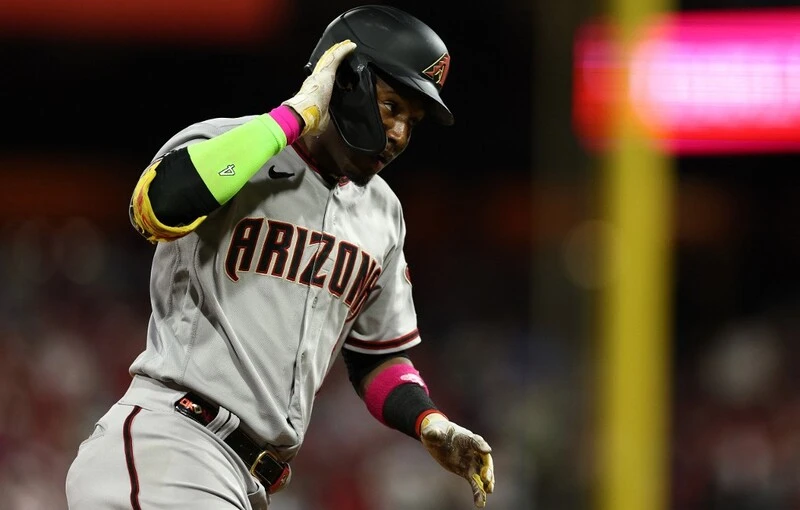 Geraldo Perdomo #2 of the Arizona Diamondbacks reacts after hitting a two-run home run in the sixth inning against the Philadelphia Phillies during Game One of the Championship Series