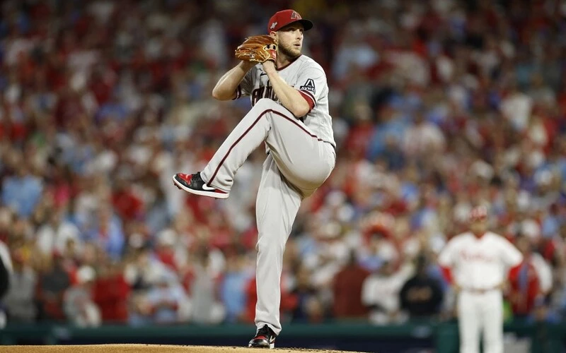 Merrill Kelly #29 of the Arizona Diamondbacks throws a first inning pitch against the Philadelphia Phillies during Game Two of the Championship Series at Citizens Bank Park on October 17, 2023 in Philadelphia, Pennsylvania. The Phillies vs Diamondbacks Odds are set for tonight's game.