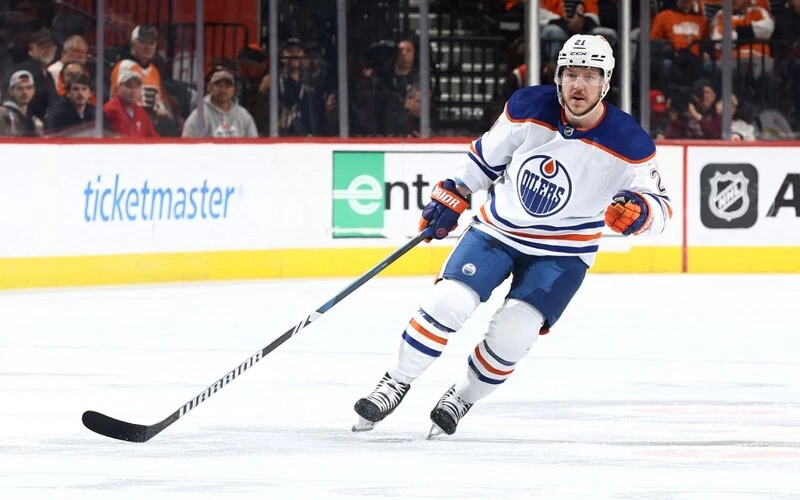 Adam Erne #21 of the Edmonton Oilers looks on against the Philadelphia Flyers at the Wells Fargo Center on October 19, 2023 in Philadelphia, Pennsylvania. The Flames vs Oilers Odds are already set.