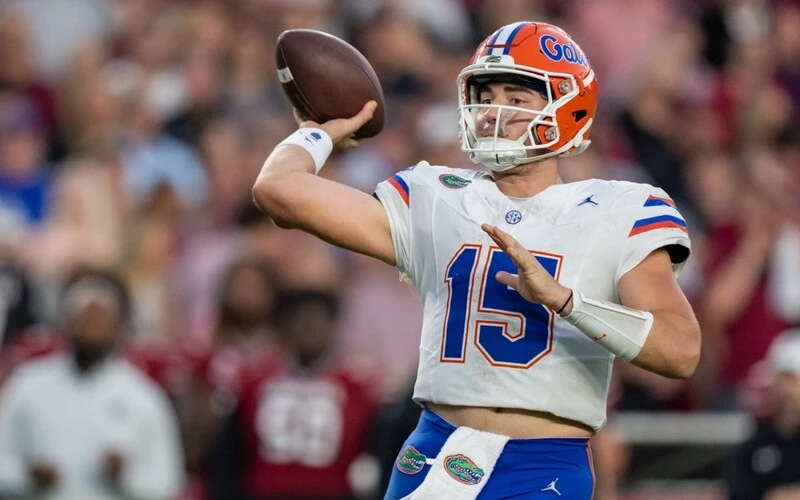 Graham Mertz #15 of the Florida Gators passes the ball in the second half of the game against the South Carolina Gamecocks at Williams-Brice Stadium on October 14, 2023 in Columbia, South Carolina. The Georgia vs Florida Odds are warming up for this important game.