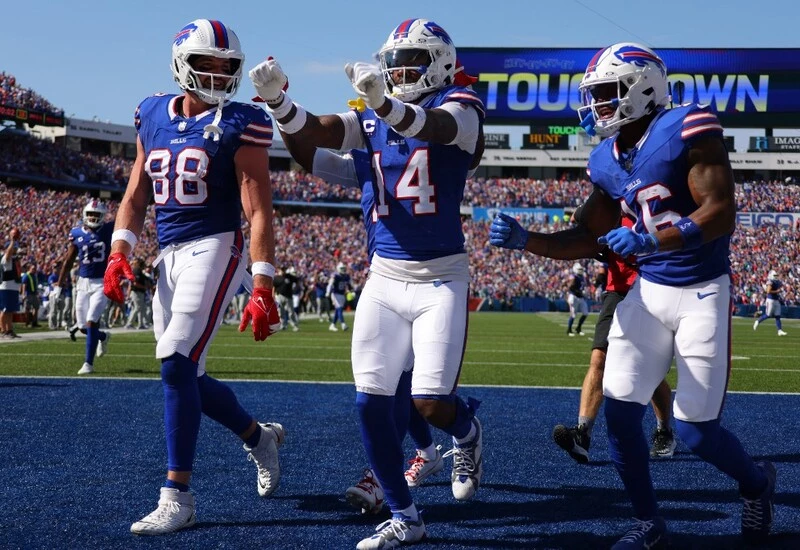 Stefon Diggs #14 of the Buffalo Bills celebrates his touchdown reception against the Miami Dolphins.