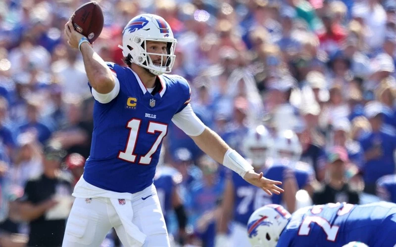 Josh Allen #17 of the Buffalo Bills passes the ball against the Miami Dolphins.