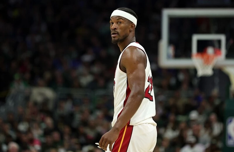 Jimmy Butler #22 of the Miami Heat walks backcourt during the second half of Game 5 of the Eastern Conference First Round Playoffs against the Milwaukee Bucks at Fiserv Forum on April 26, 2023 in Milwaukee, Wisconsin. The Heat vs Bucks Odds are already set for tonight's game.