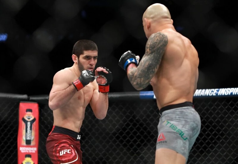 Islam Makhachev fights Gleison Tibau in their Lightweight fight during UFC 220. The Makhachev vs Volkanovski prediction fight is close.