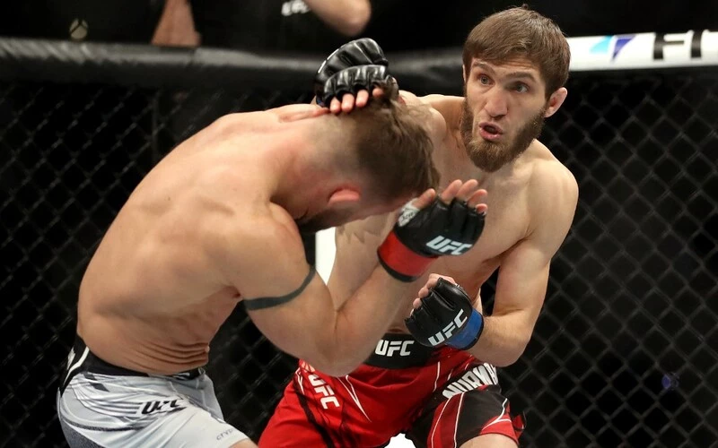 Said Nurmagomedov of Russia exchanges punches with Cody Stamann in their bantamweight fight during the UFC 270 event