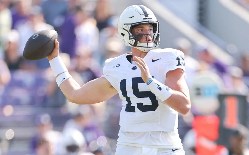 Drew Allar #15 of the Penn State Nittany Lions throws a pass against the Northwestern Wildcats. The Penn State vs Ohio State Odds are already set for this exciting matchup.