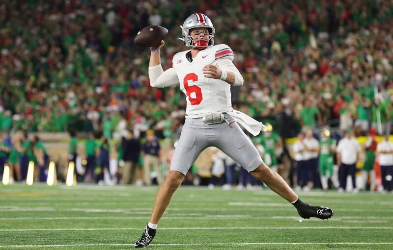 Kyle McCord #6 of the Ohio State Buckeyes throws a pass against the Notre Dame Fighting Irish. The Penn State vs Ohio State Odds are already set for this exciting matchup.