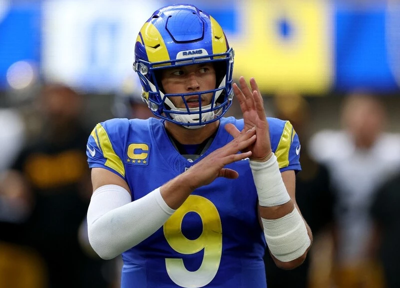 Matthew Stafford #9 of the Los Angeles Rams calls a timeout during a 24-17 loss to the Pittsburgh Steelers at SoFi Stadium on October 22, 2023 in Inglewood, California. The Rams vs Cowboys betting odds are set.